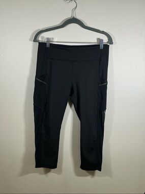 Lululemon Black Mesh Panel Crop Leggings Size 10 Side Pockets Zip Detail